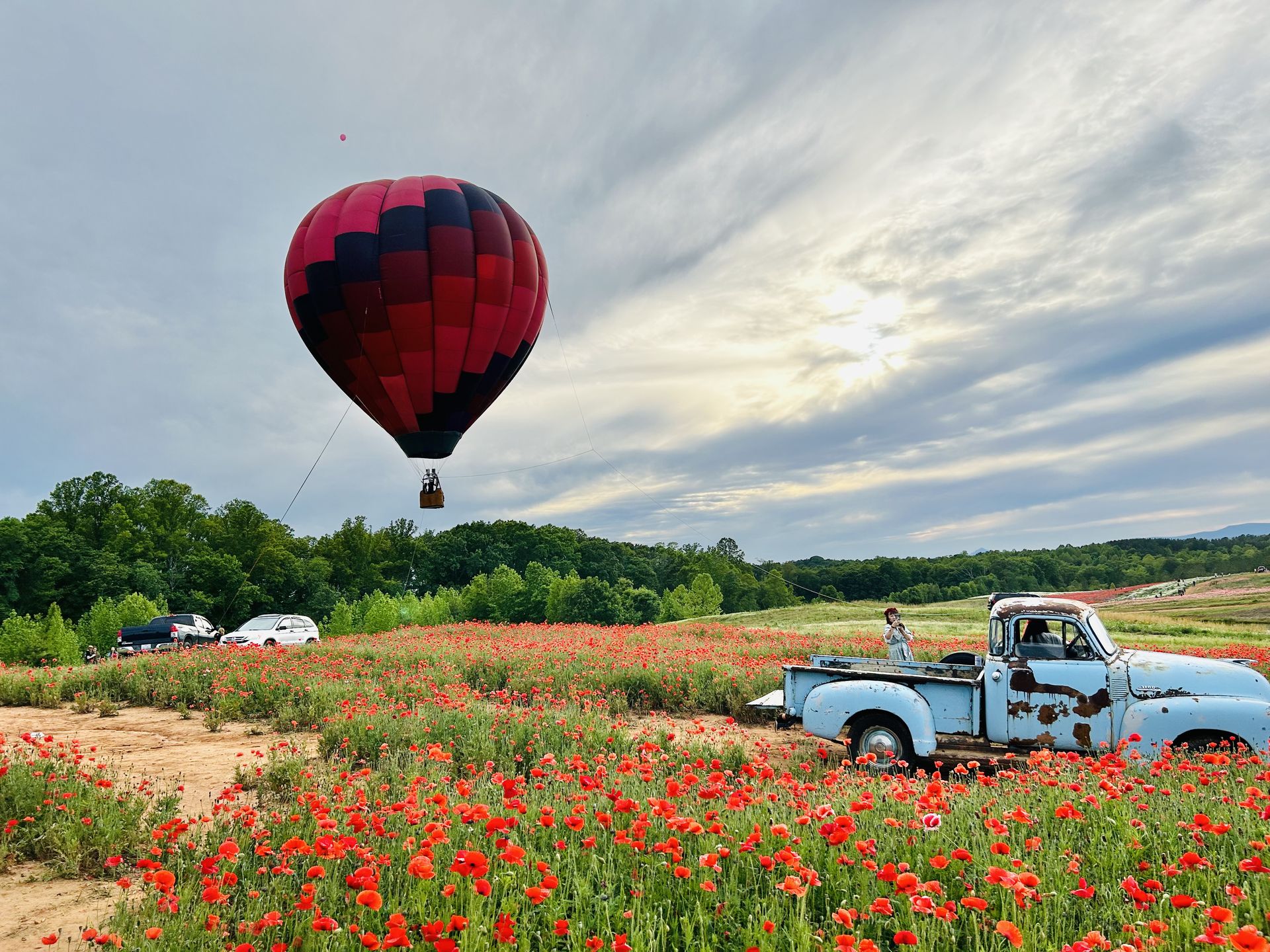 Balloon flying low over an open field