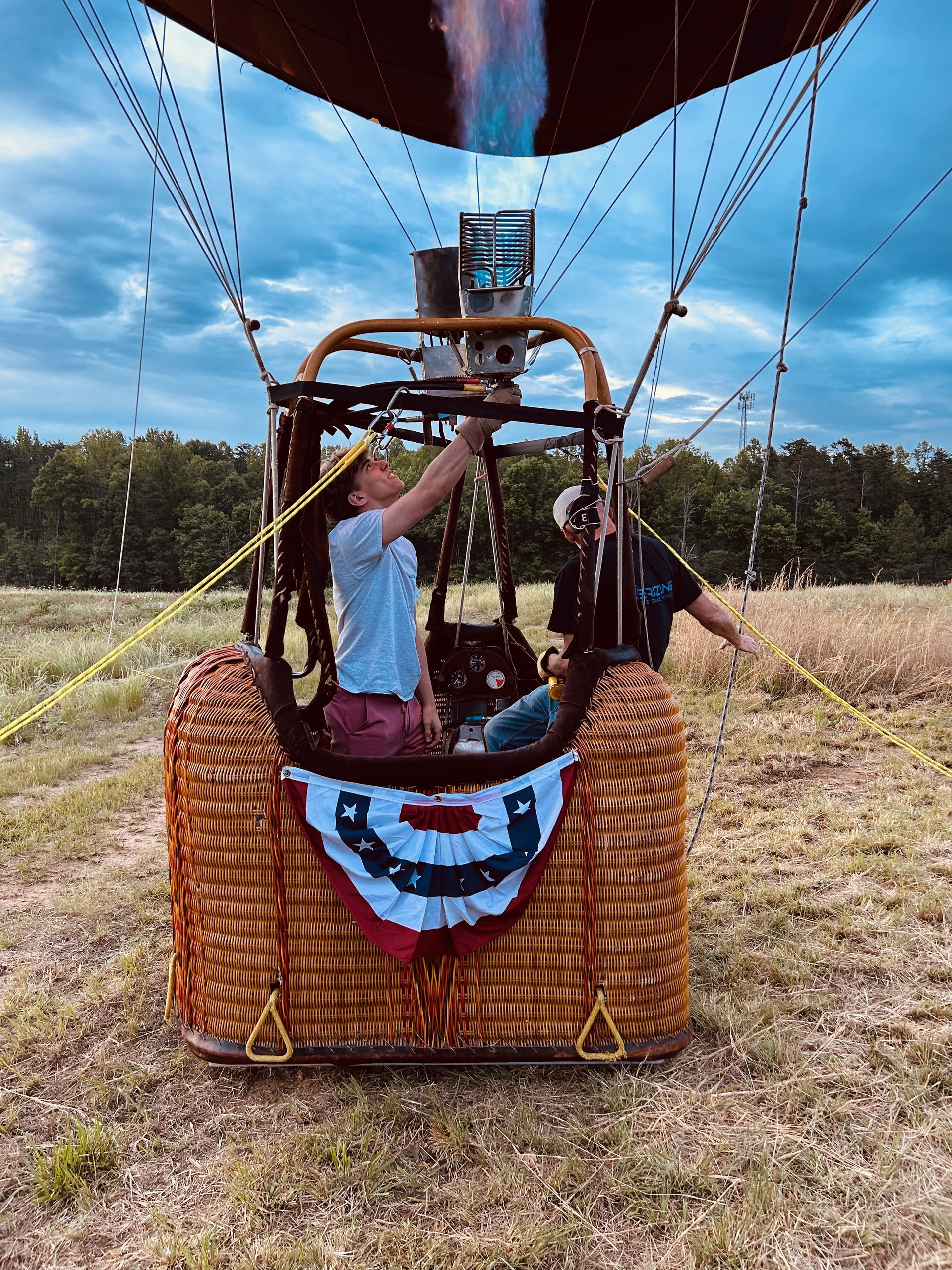 Passenger in the basket against a blue sky