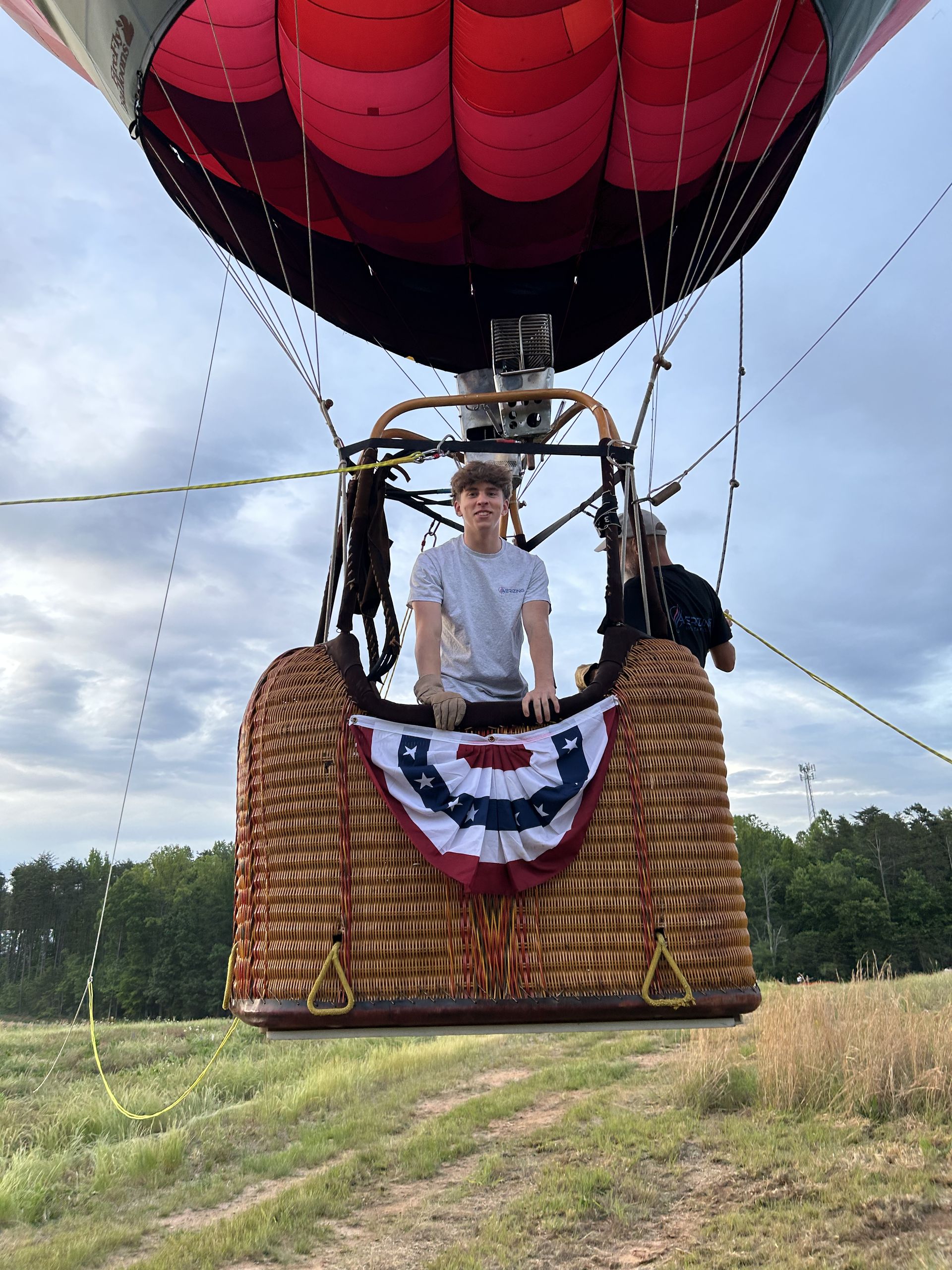 Guests in the flag-draped basket before liftoff