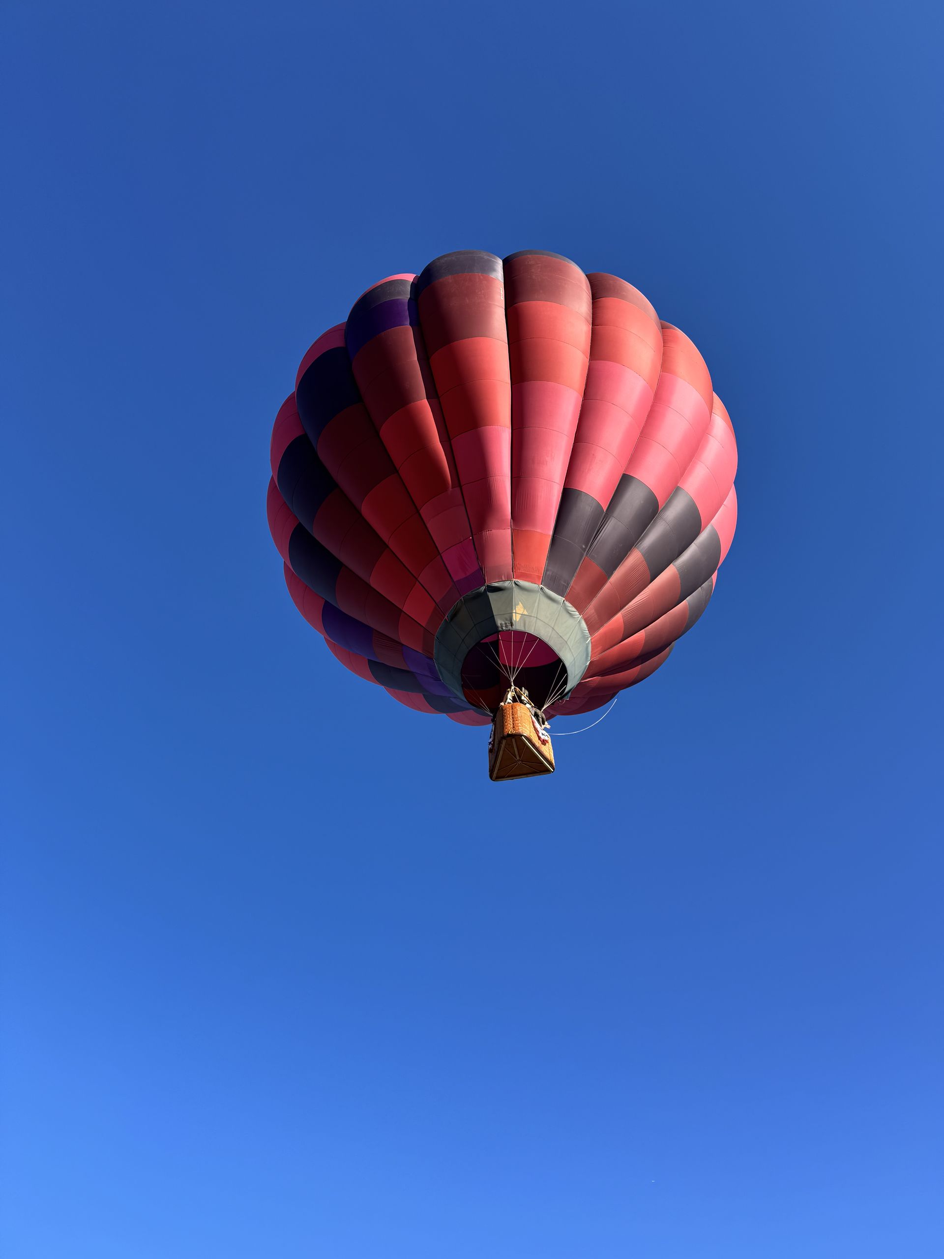 Balloon drifting through open sky