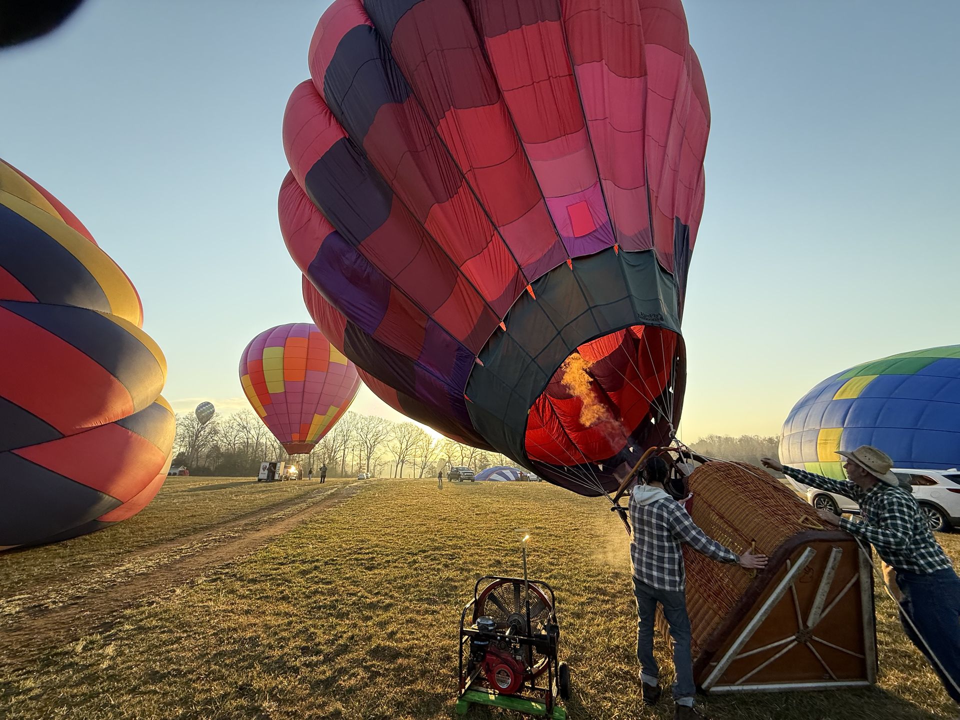 Balloons being prepped and inflated in the field
